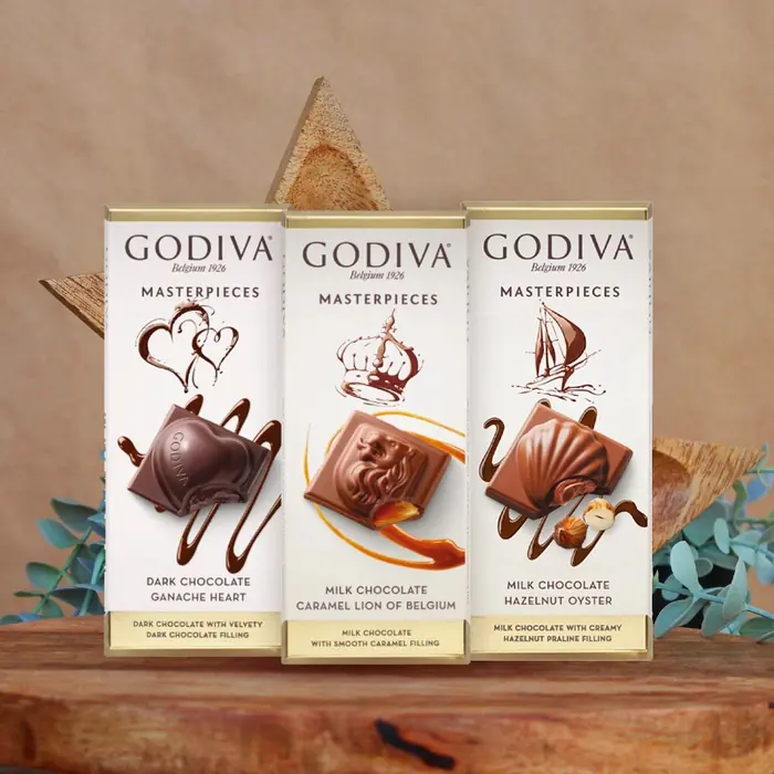 Godiva Masterpieces 80 Gram Tablet — 80gr Godiva marka çikolata fındıklı veya fıstıklı olabilir
